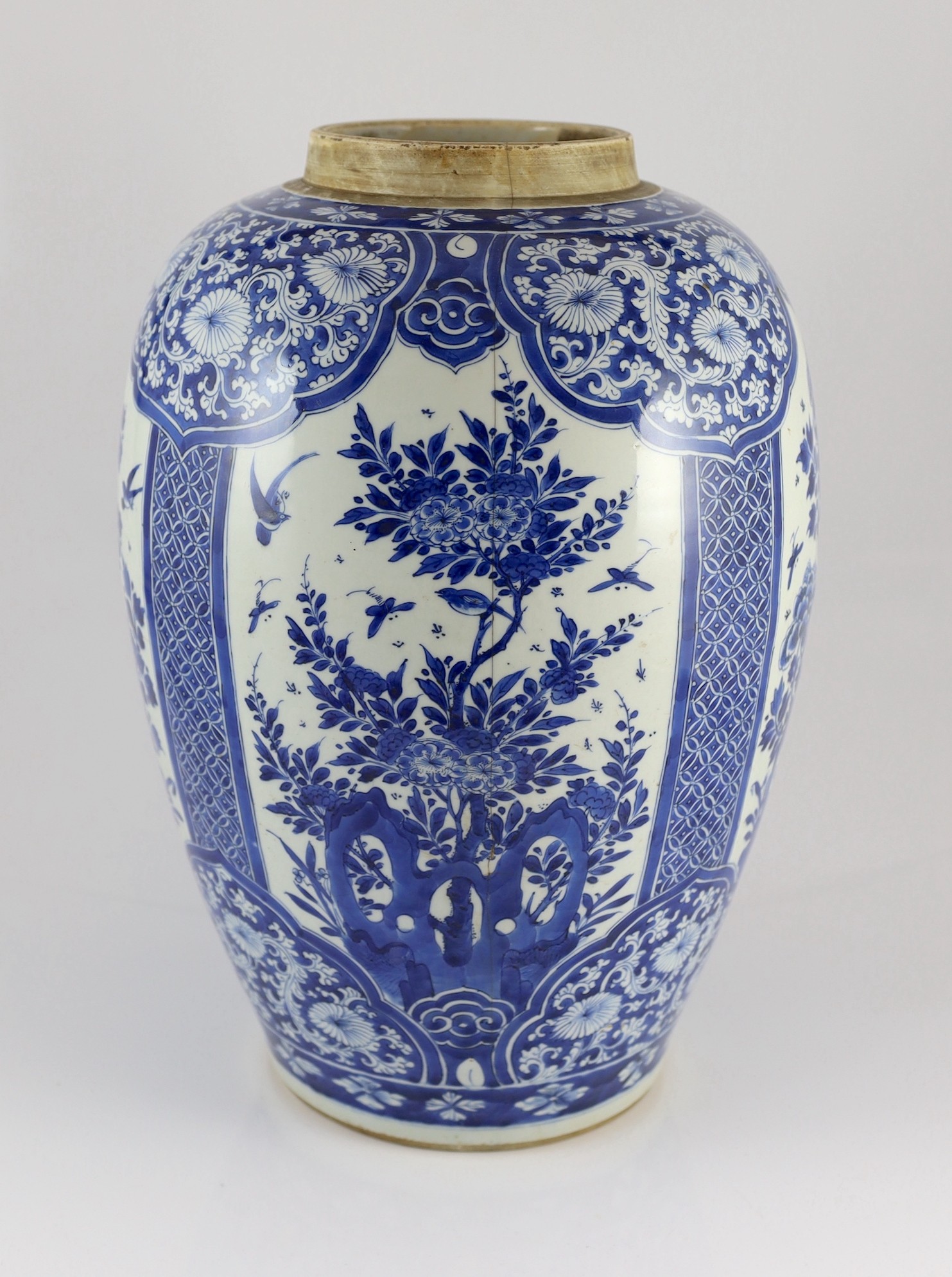 A large Chinese blue and white large ovoid jar, Kangxi period, 45cm high, cracked